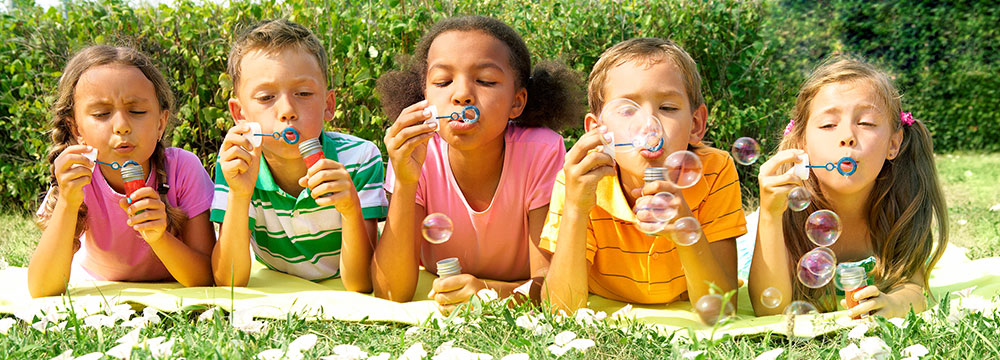 Kids Blowing Bubbles at the Pediatric Dentist in Charlotte, Rock Hill and Gastonia